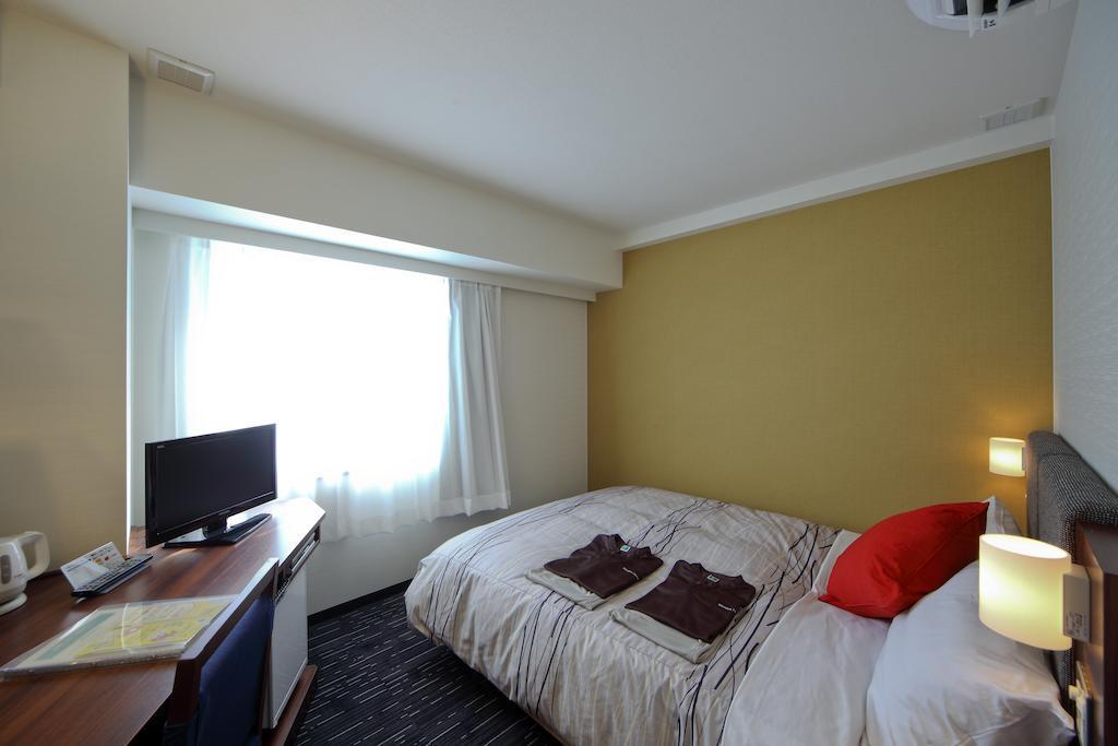 Tsuruga Manten Hotel Ekimae Quarto foto